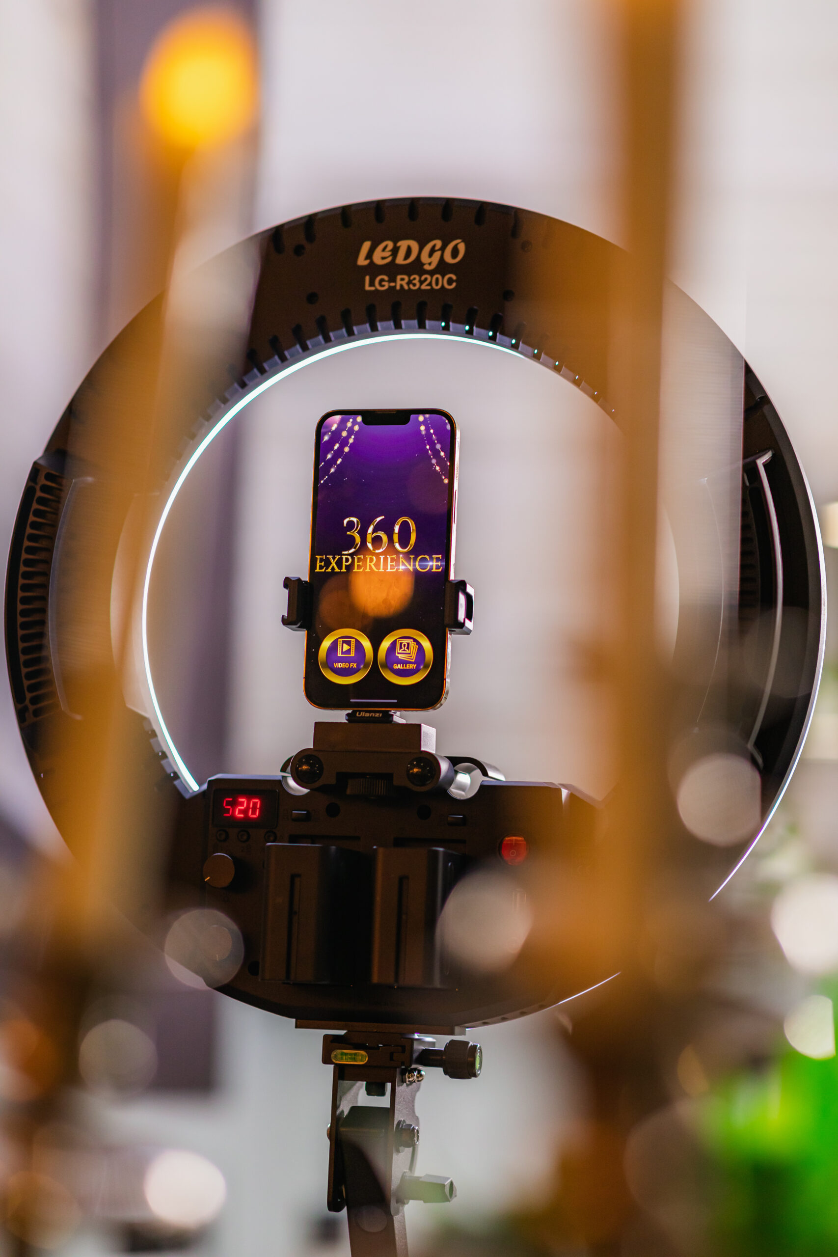 LED stage and 360 spinner booth capturing video at a live event