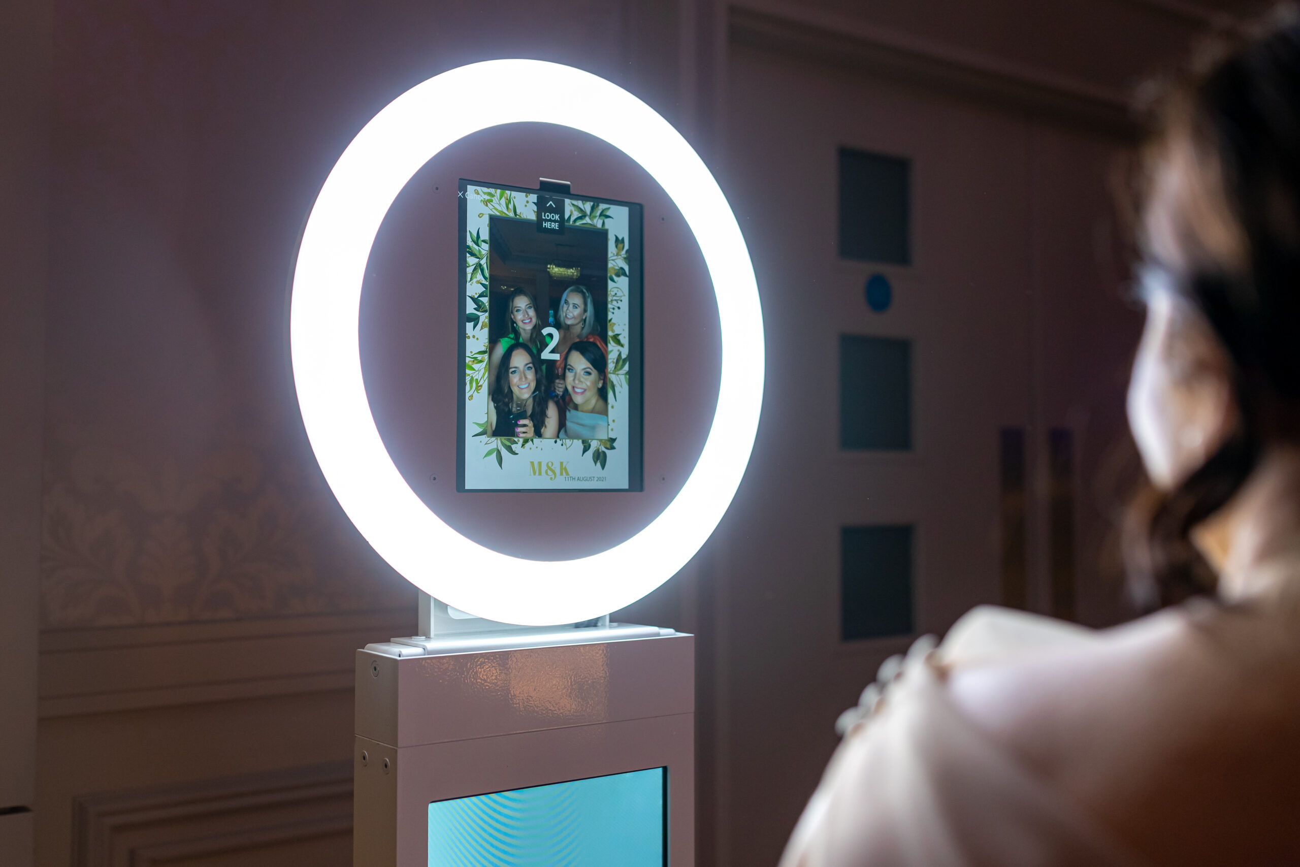 LED stage and 360 spinner booth capturing video at a live event